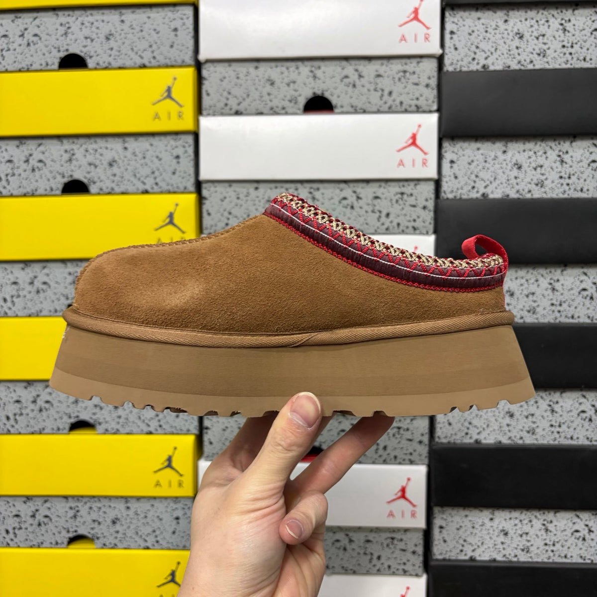 UGG Tazz Platform Slipper – Suede Mule with Shearling Lining, Red & Gold Braided Collar Trim, Red Pull Tab & Chunky Platform Sole in Chestnut